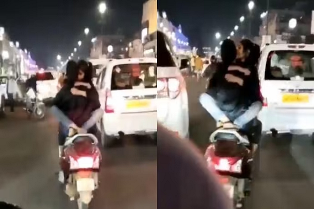 Lucknow police searching for couple after video of them romancing on scooty goes viral, Watch video here