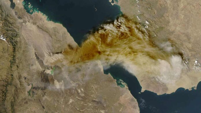 A satellite image shows ash rising from the eruption of the Hayl