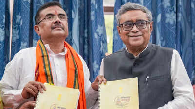 west-bengal-chief-minister-suvendu-adhikari-and-state-finance-minister-swapan-dasgupta-displaying-copies-of-the-state-budget-after-its-presentation-in-the-west-bengal-legislative-assembly-